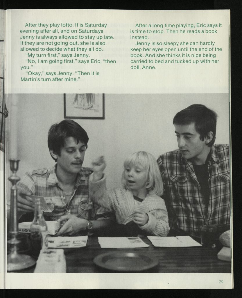 Page 29 of Jenny Lives With Eric and Martin containing text from the story and a photograph showing a young girl sat between two men at a table.